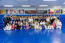 Unlimited MMA Classes for One Week and Initial Gloves for One or Two at Elite Mixed Martial Arts (Up to 82% Off)