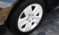 Tire Purchase at Midas (Up to 60% Off). Two Options Available. 