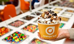 Frozen Yogurt at Orange Leaf Frozen Yogurt (40% Off). Eight Options Available.