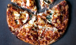 $20 Toward Carryout and a $20 Gift Card at Southside Flying Pizza (25% Off)