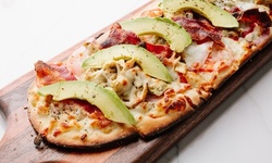 American and Italian Food and Drink at Pinstripes Houston (Up to 25% Off). Two Options Available.