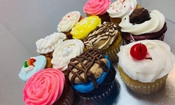 12 Cupcakes or Cake Pops at Biscuit Eater Bakery (Up to 52% Off)