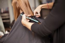 $52 for Haircut, Shampoo, Deep Condition, and Style at 3 Strands Salon ($100 Value)