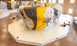 One Day Pass with Shoe Rental for One or Two Adults or One Child at Momentum Indoor Climbing (Up to 62% Off)