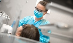 Basic Dental Exam, Cleaning, and X-Rays with $100 or $600 towards Deep Cleaning