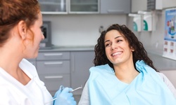 $56.80 for Dental Exam, Consultation, X-Rays, and Cleaning at Royalty Dental Associates ($369 Value)