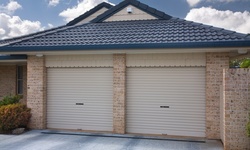One Lube N' Tune Door Inspection with or Without Nylon Rollers from D'Garage Door Services (Up to 55% Off)