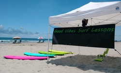 Two-Hour Surfing Lesson with Surf Board and Wetsuit for 1, 2, or 4 at Good Vibes Surf Lessons (Up to 44% Off)