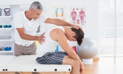 $17.32 for Chiropractic Consultation with 30-Minute Massage and X-rays at Optimal Health Center ($305 Value)