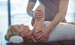 Consultation with Exam and One, Two, or Three Adjustments at Infinite Wellness of Kansas City (Up to 88% Off)