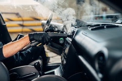 Mobile Steam Cleaning and Disinfecting Package for One Sedan or SUV from Earth Car Wash (Up to 36% Off)