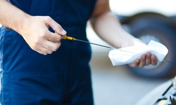 $47.99 for Synthetic Oil Change, Tire Rotation, Battery Inspection at Delco Tire & Automotive ($89.99 Value)