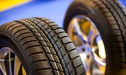 Four New Tires at All American Tire (Up to 62% Off). Two Options Available 