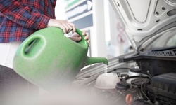 Oil Change with Tire Rotation and Brake Inspection at A1 Automotive (Up to 72% Off). Three Options Available.