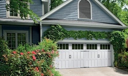Garage Door Tune-Up and Inspection with Optional Set of Whisper Rollers from Sears Garage Doors (Up to 70% Off)