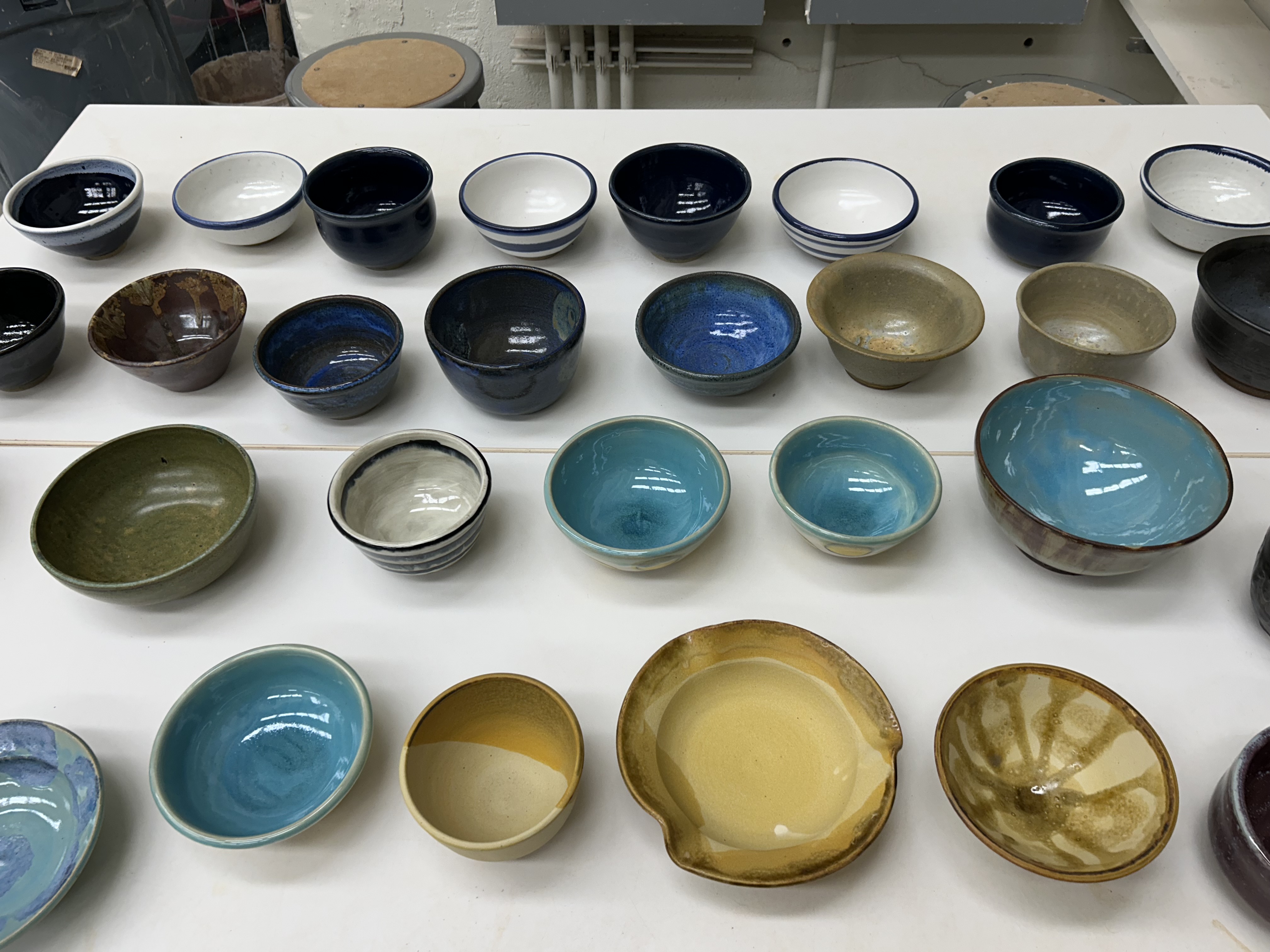 Empty ceramic bowls for the Empty Bowls food insecurity fundraiser