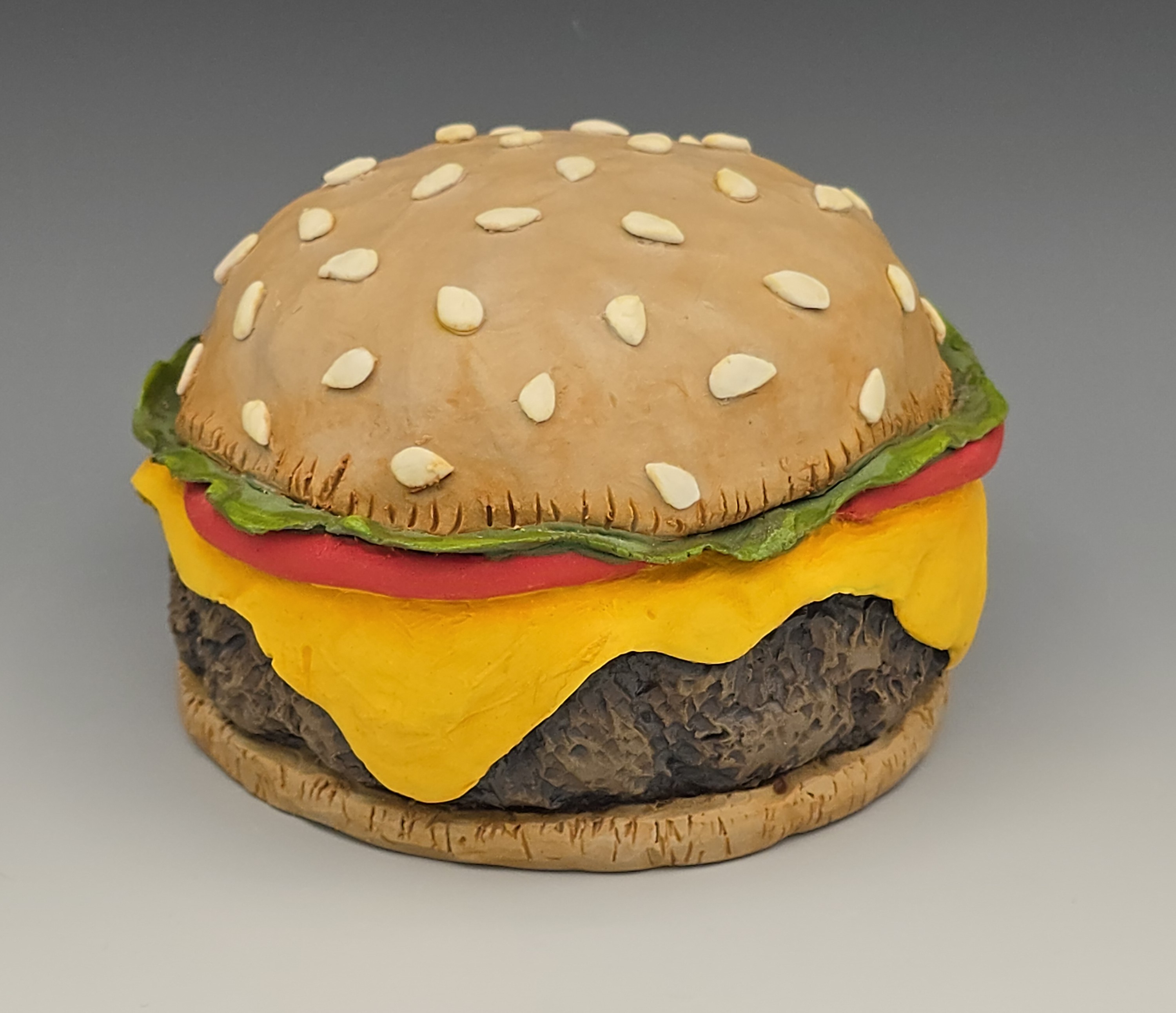 "Hamburger," ceramics, by Eva Hozinez, 2025.