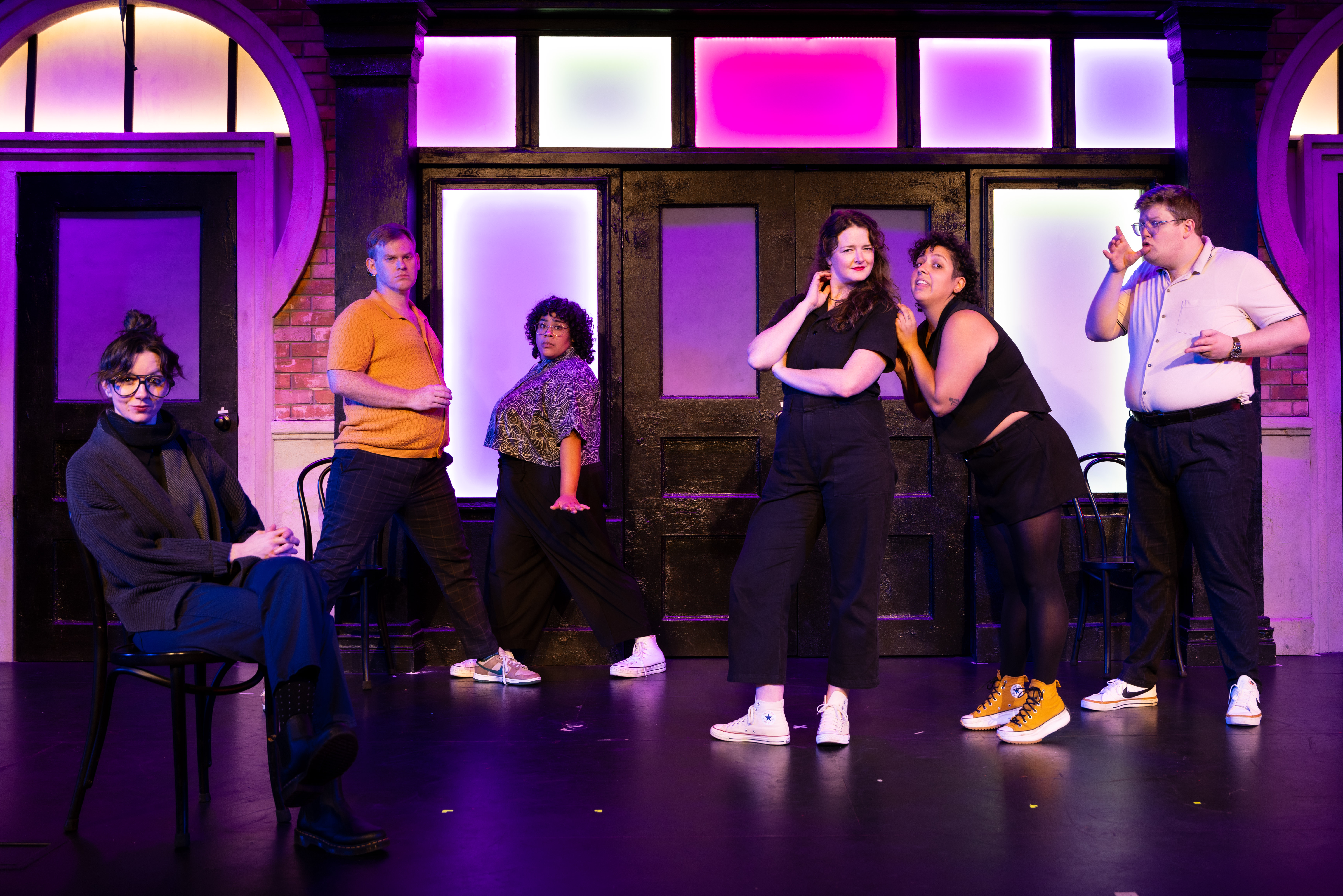 The cast of The Second City on stage